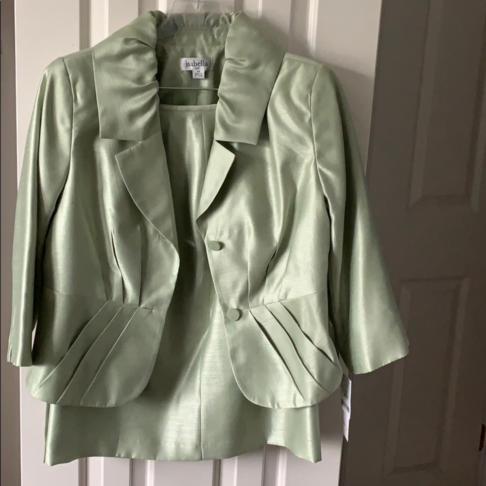 Isabella suits in a beautiful green.